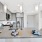a kitchen with white cabinets