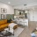 a living room with a couch and a dining table