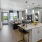 a kitchen with white cabinets
