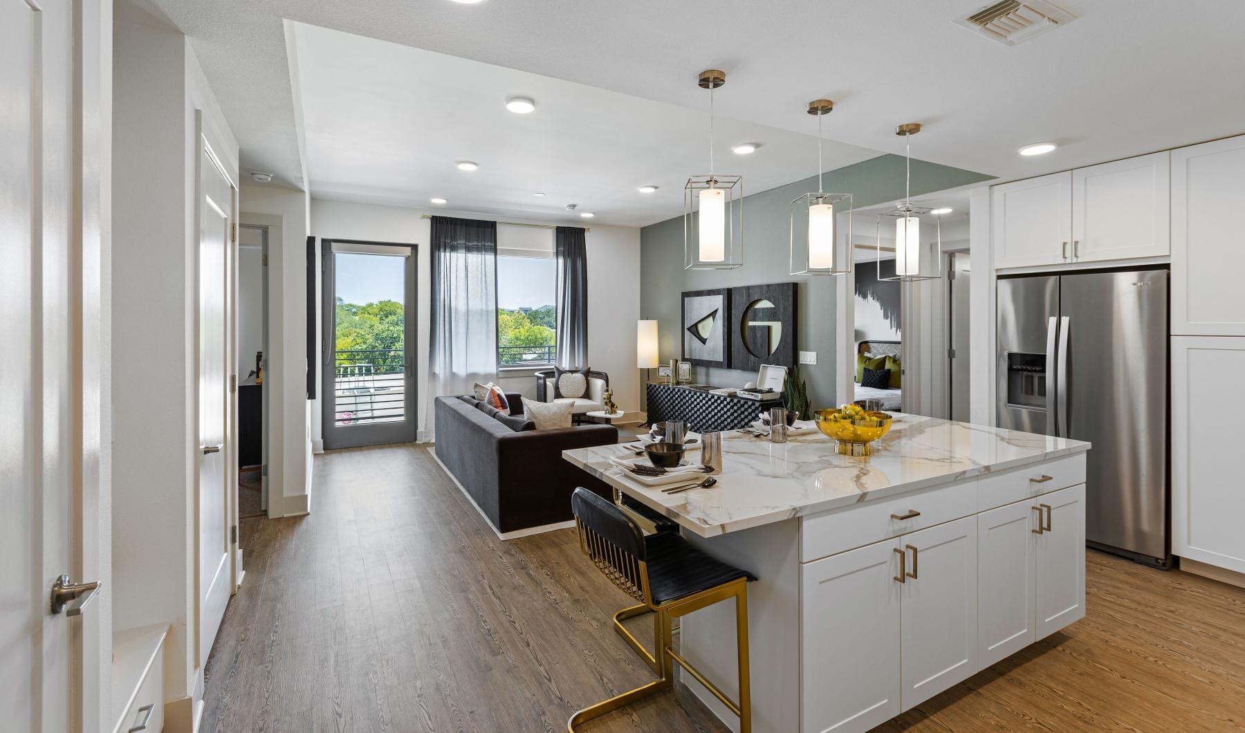 a kitchen with white cabinets
