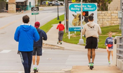 Settle into comfort at Avenir a group of people rollerblading