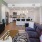 a living room with a couch and a table