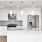 a kitchen with white cabinets