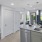 a kitchen with white cabinets